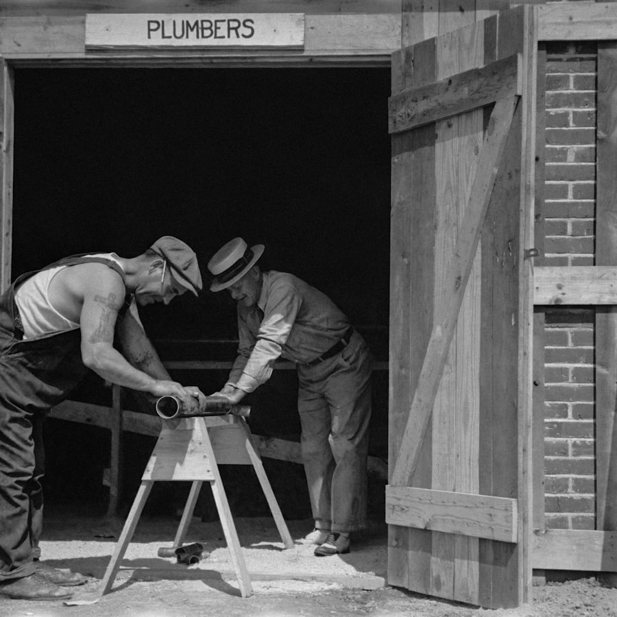 Plumber repairing pipe